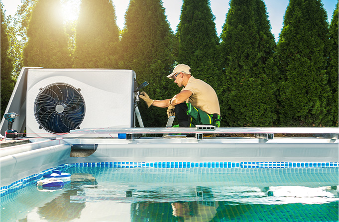 Man fixing a pool pump